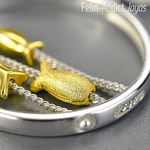 Boucles d'oreilles asymétriques poissons en argent sterling | Felin-Addict